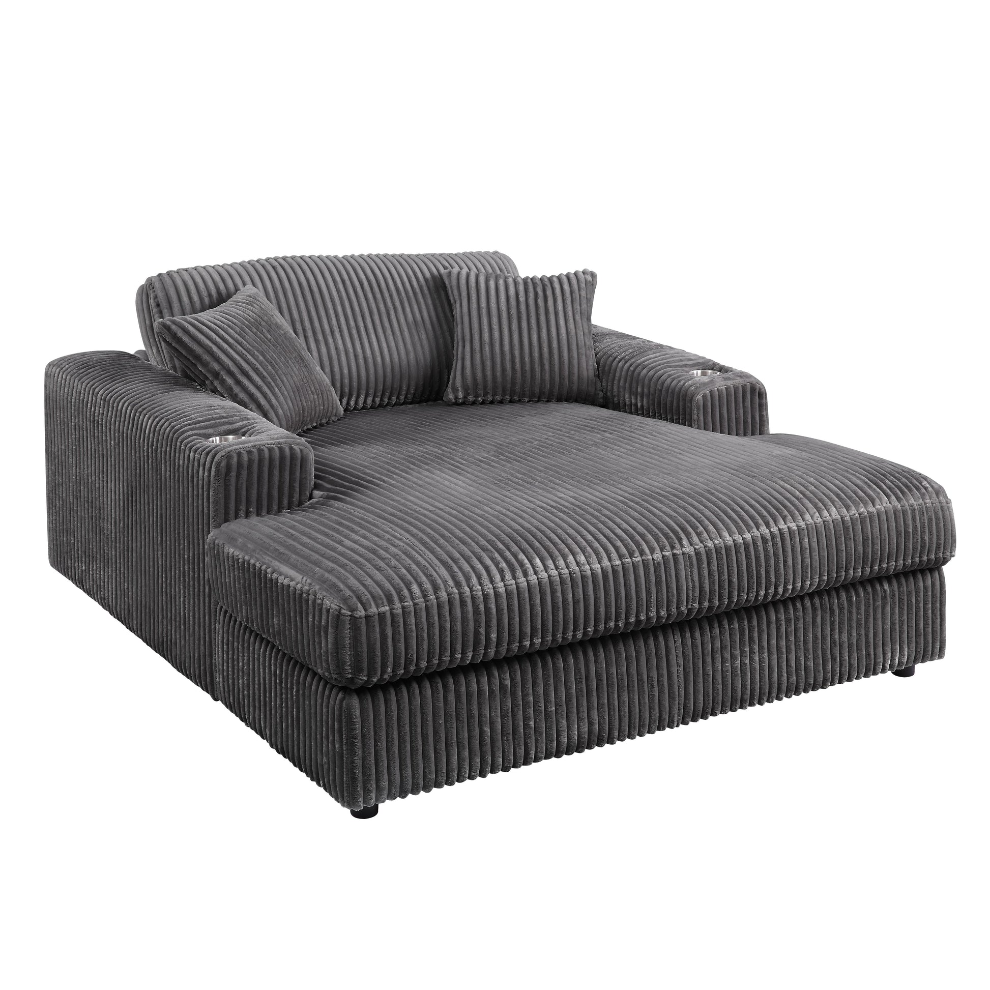 Plush grey corduroy chaise lounge with two throw pillows and builtin cup holders