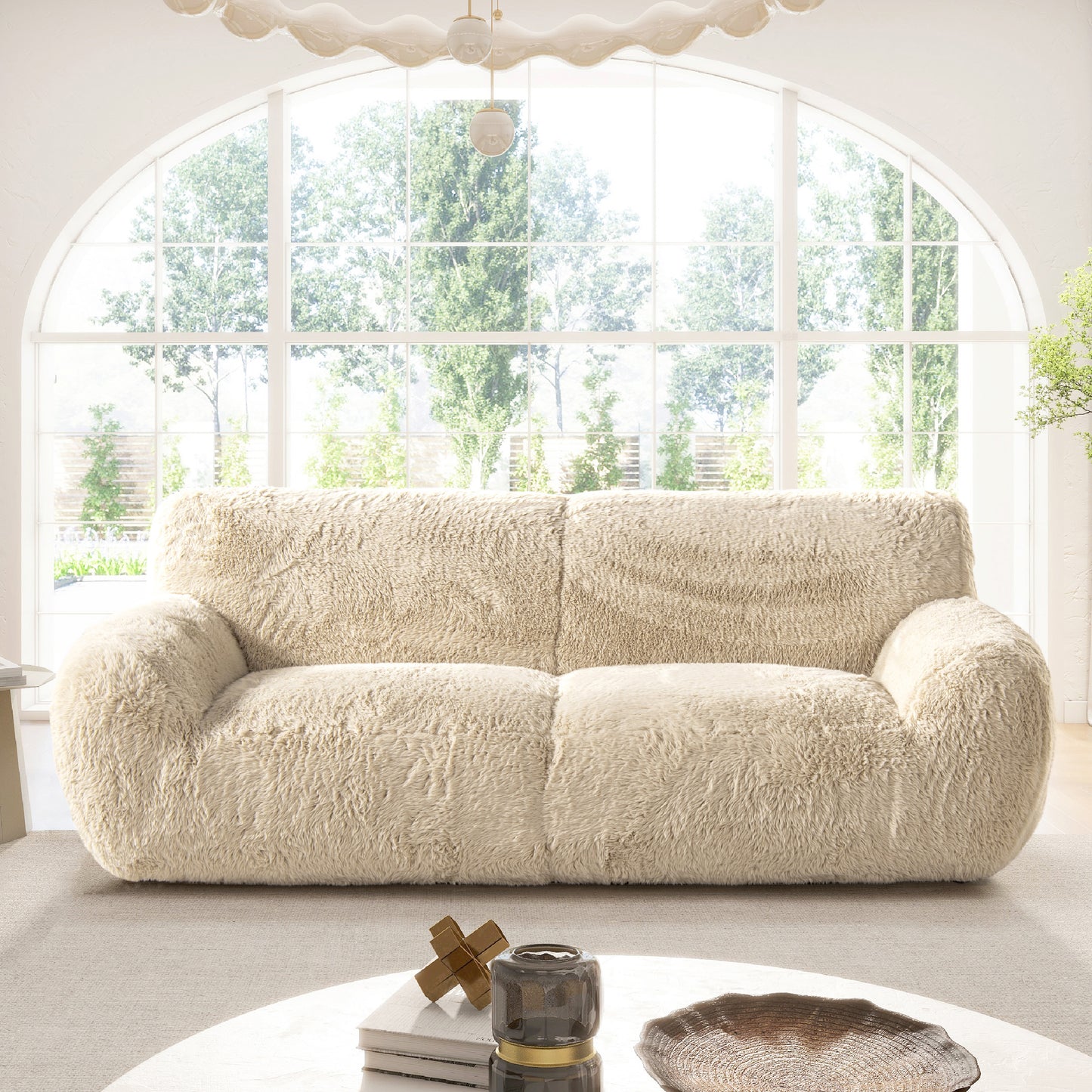 Plush cream boucle sofa with deep inviting cushions perfect for a cozy living room