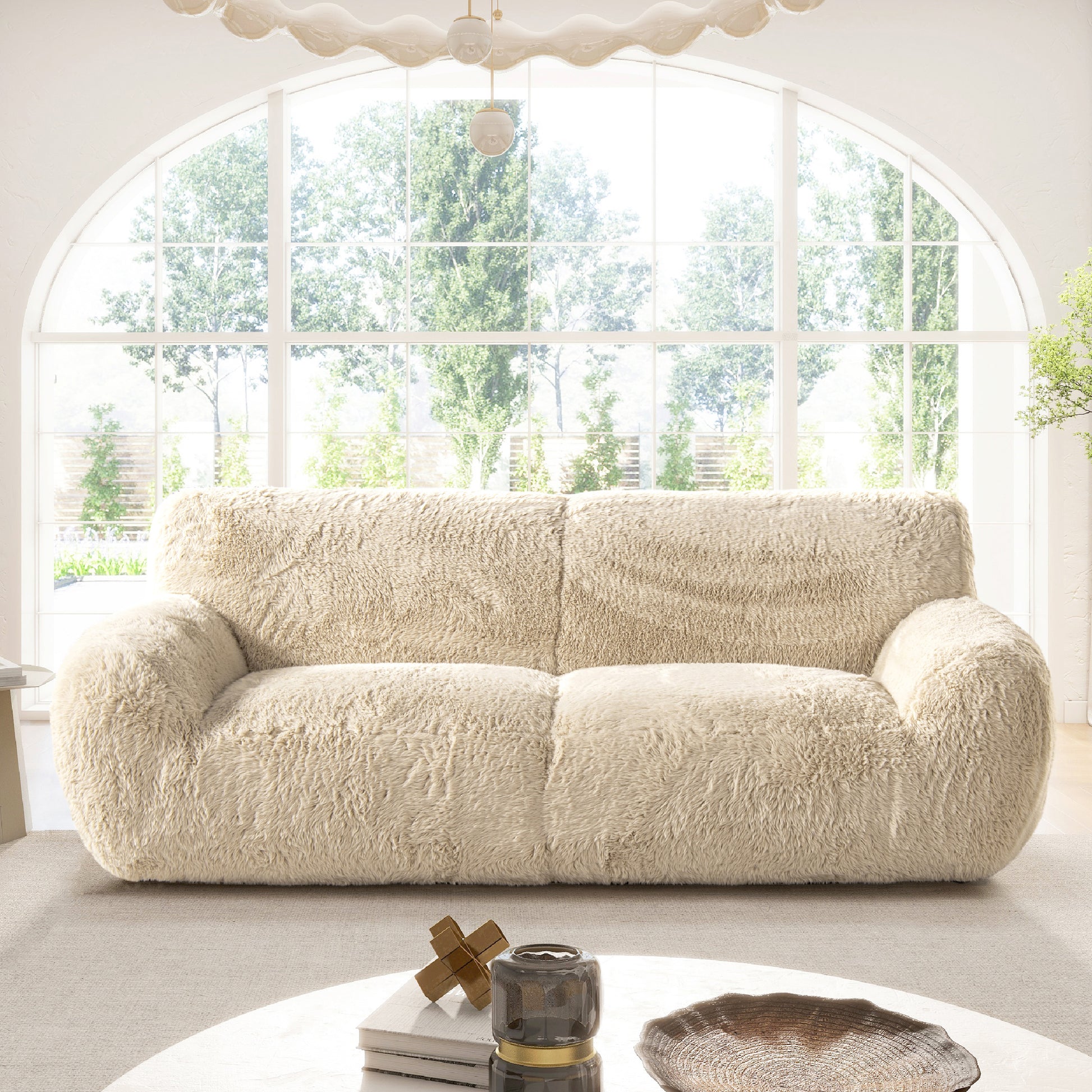 Plush cream boucle sofa with deep inviting cushions perfect for a cozy living room