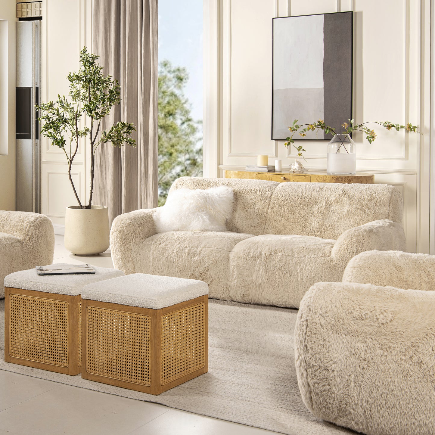 Plush cream boucle sofa with a fluffy accent pillow perfect for a cozy living room setting
