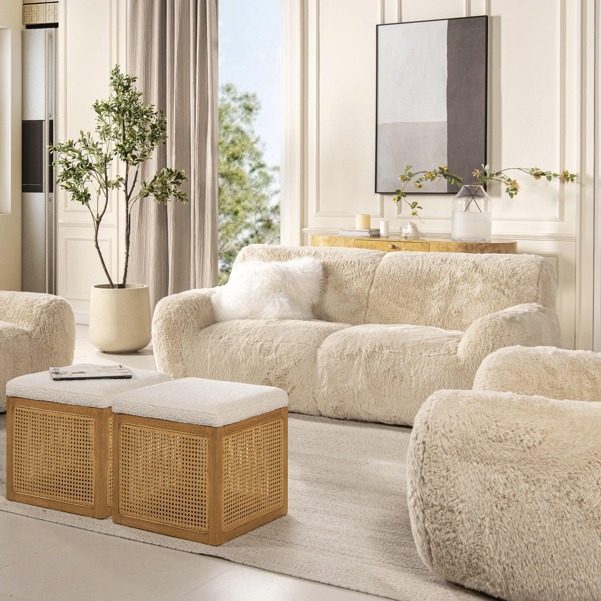 Plush cream boucle sofa with a fluffy accent pillow perfect for a cozy living room setting