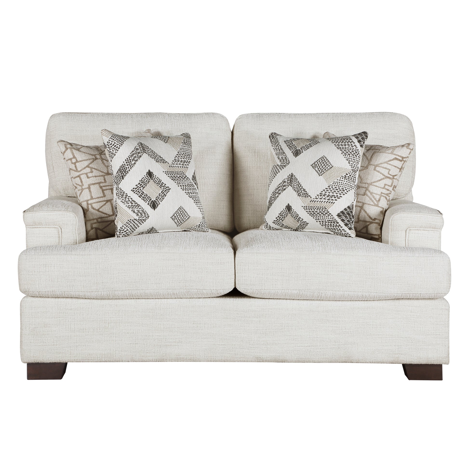 Cream upholstered loveseat with geometric pattern throw pillows and dark wood legs