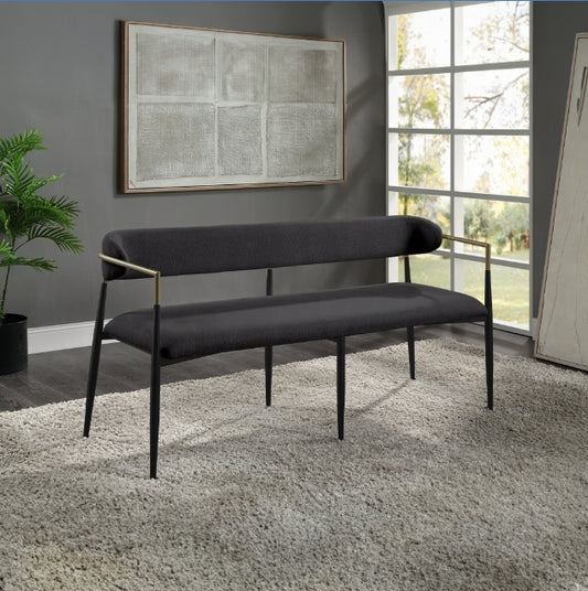 Modern charcoal upholstered bench with gold metal armrests