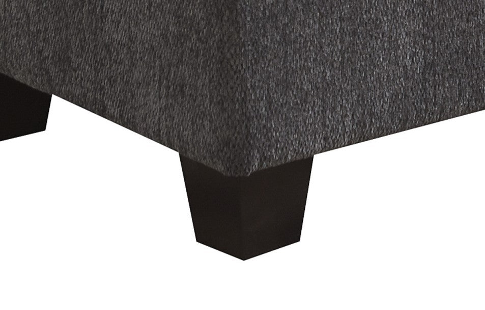 Dark gray textured fabric sofa arm with dark wood square feet