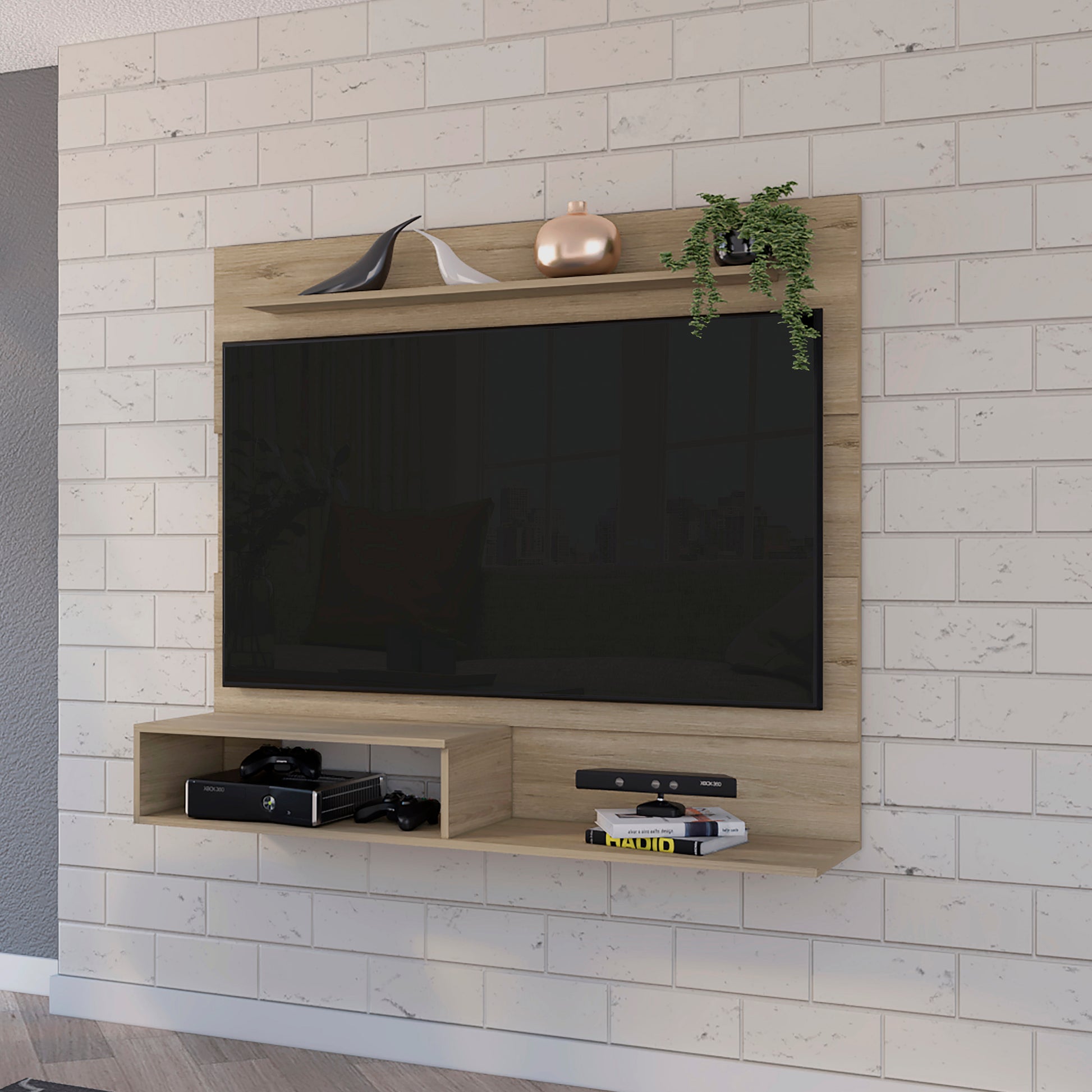 Light oak TV stand with integrated shelves holding Xbox and decorative items