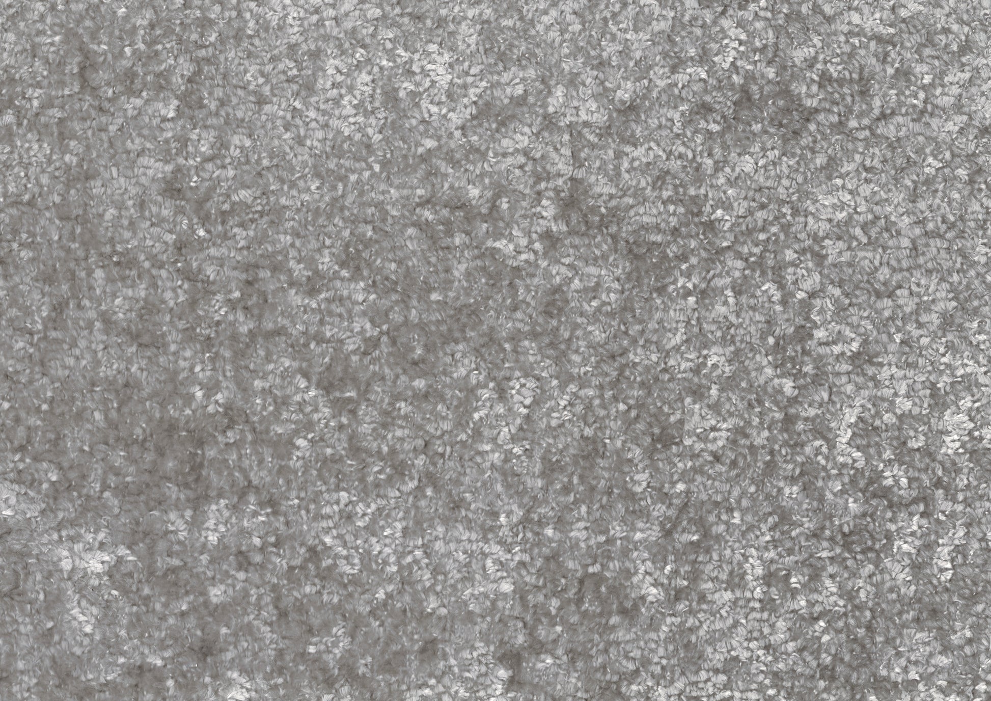 Textured grey shag carpet closeup creating a cozy floor covering