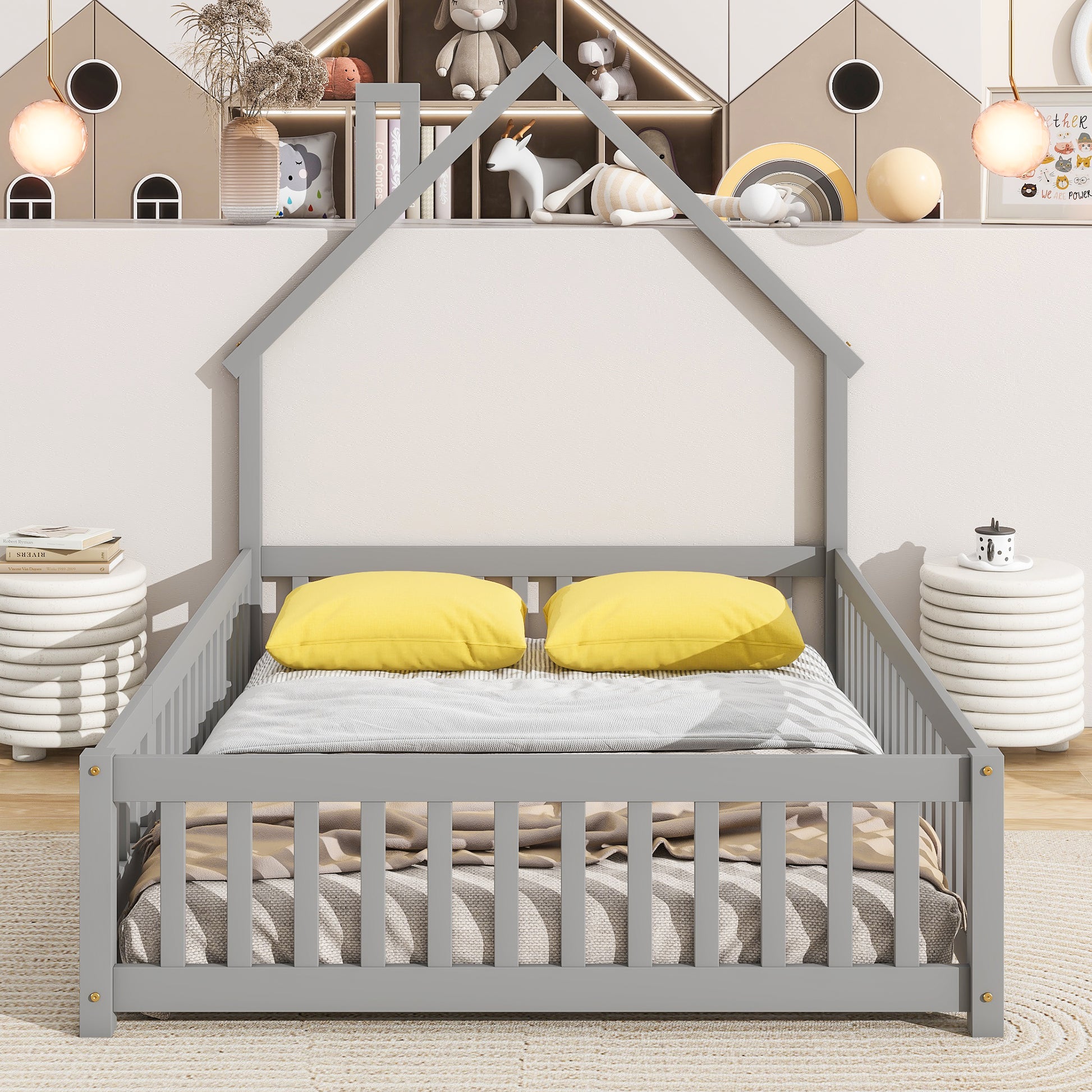 Gray wooden house bed frame for kids with yellow pillows