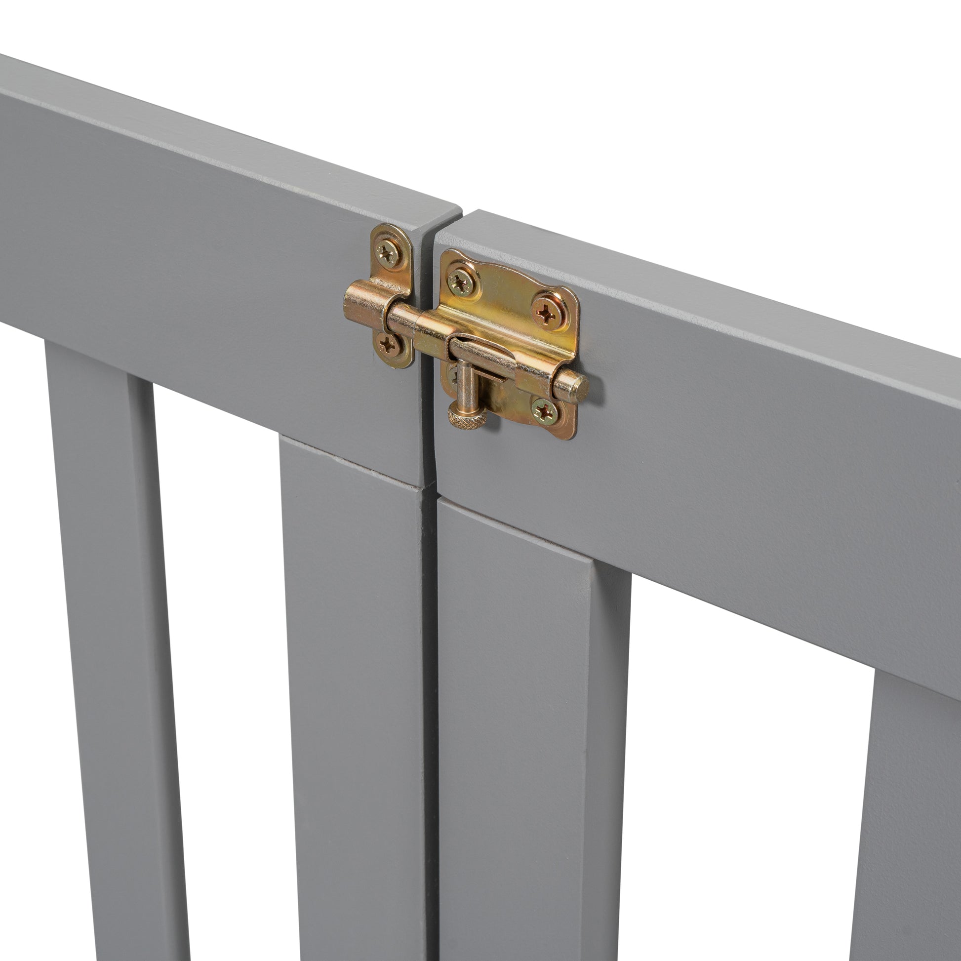 Gray wooden pet gate with brass bolt latch detail