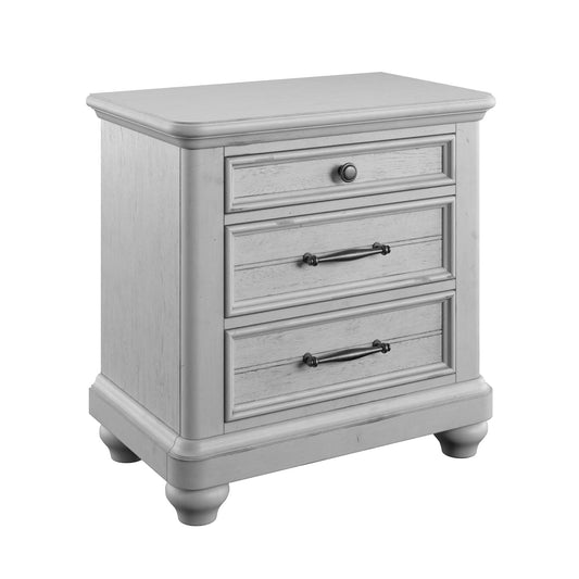 Light grey distressed wood nightstand with three drawers and antique brass hardware