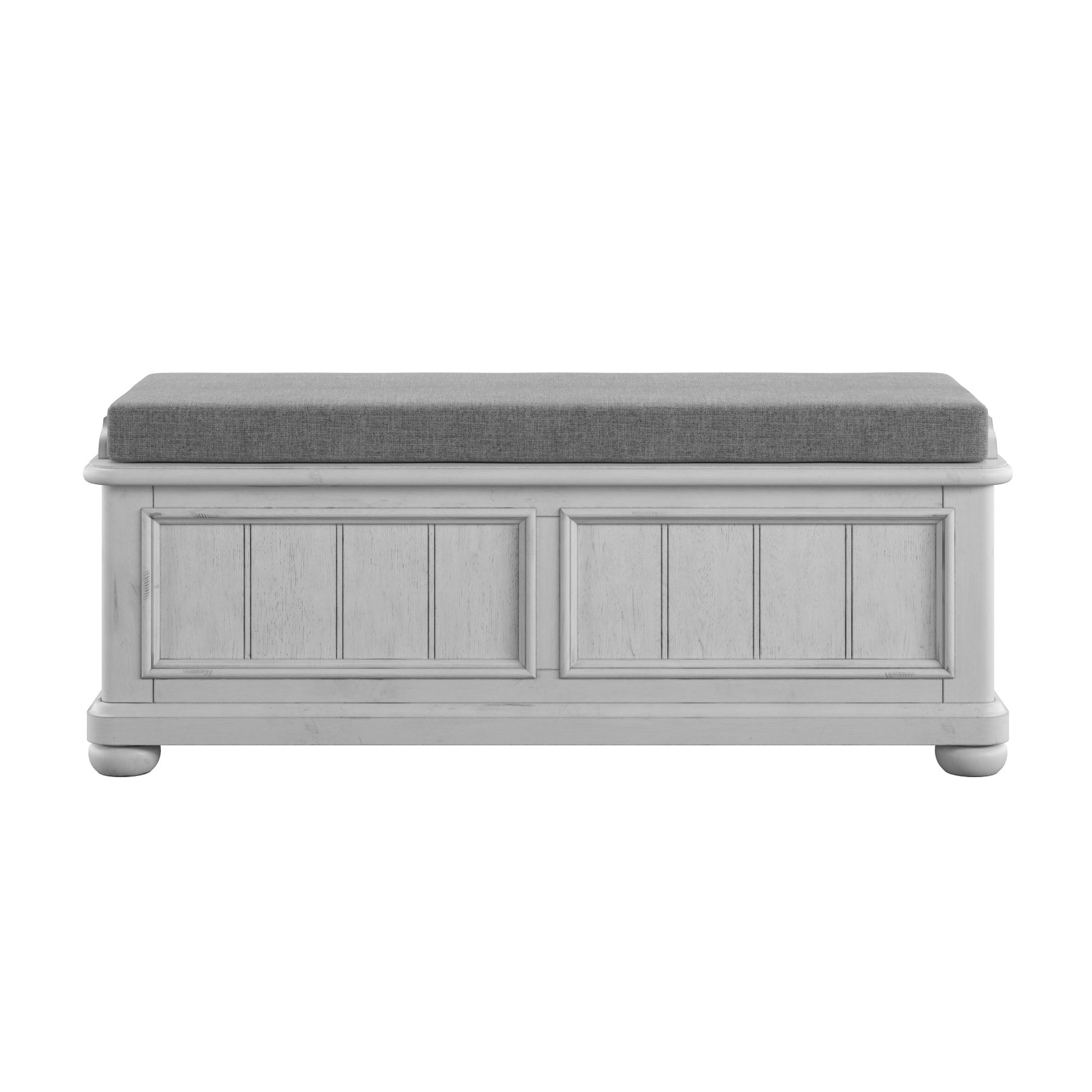 White storage bench with grey upholstered seat and paneled detail