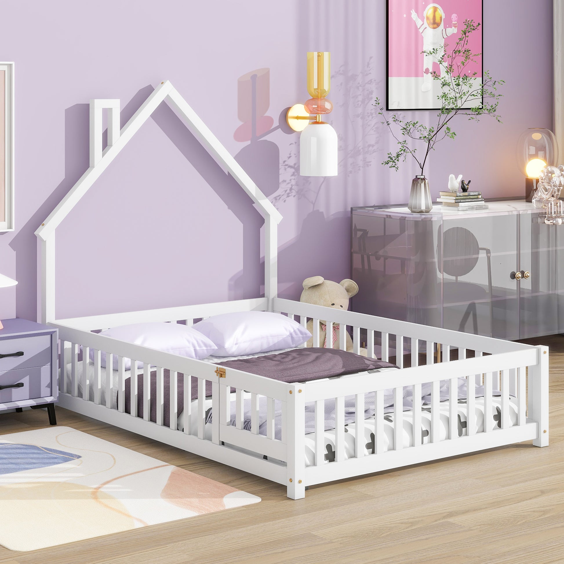White wooden toddler bed with houseshaped frame and safety rails
