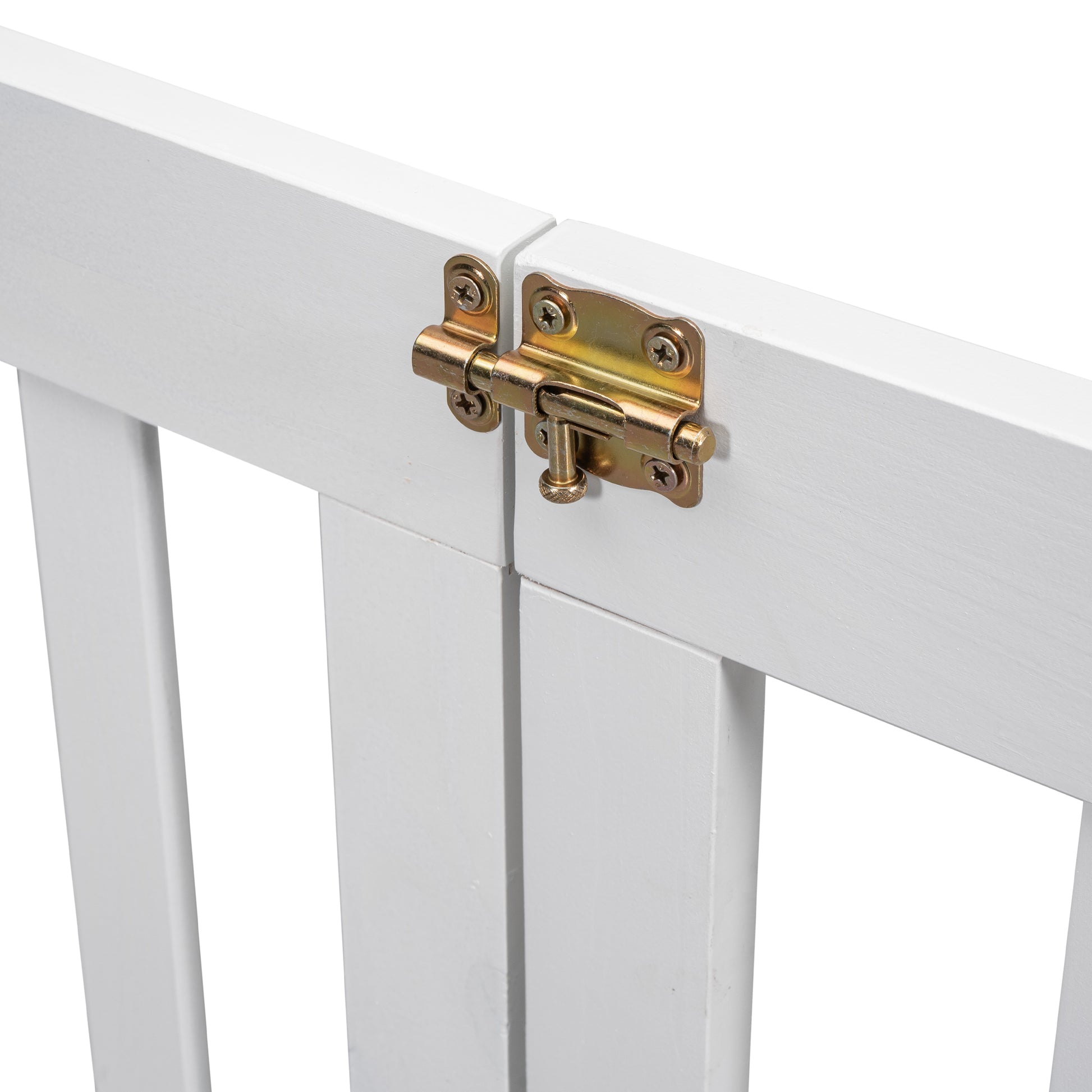 White wooden gate latch detail with gold hardware