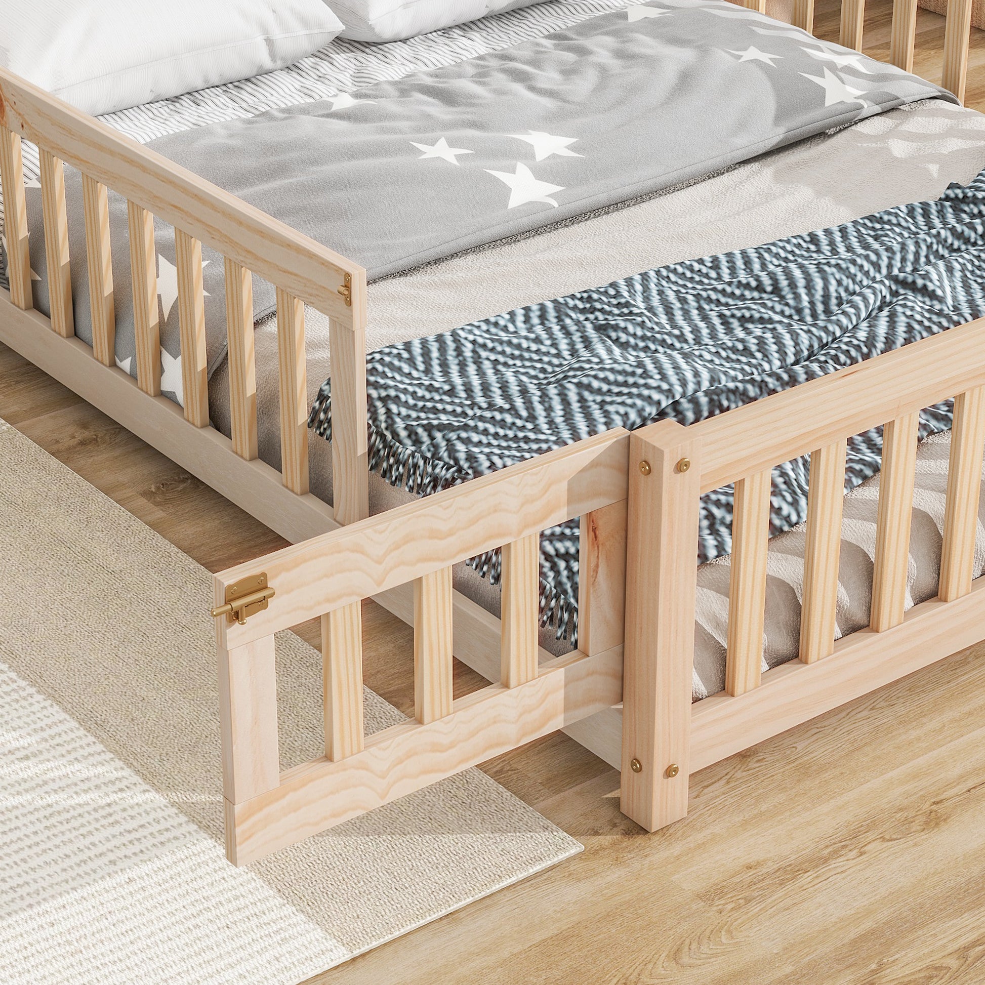 Natural pine wood toddler bed with removable side guard and star print bedding