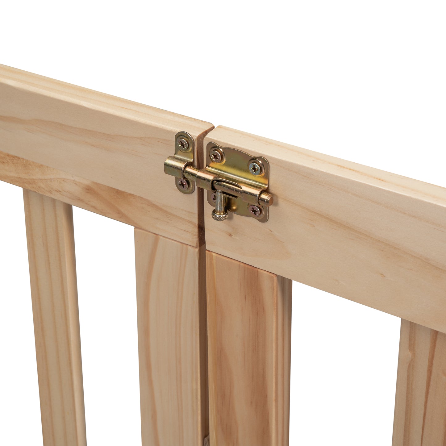 Closeup of a brass bolt latch on a natural wood baby gate