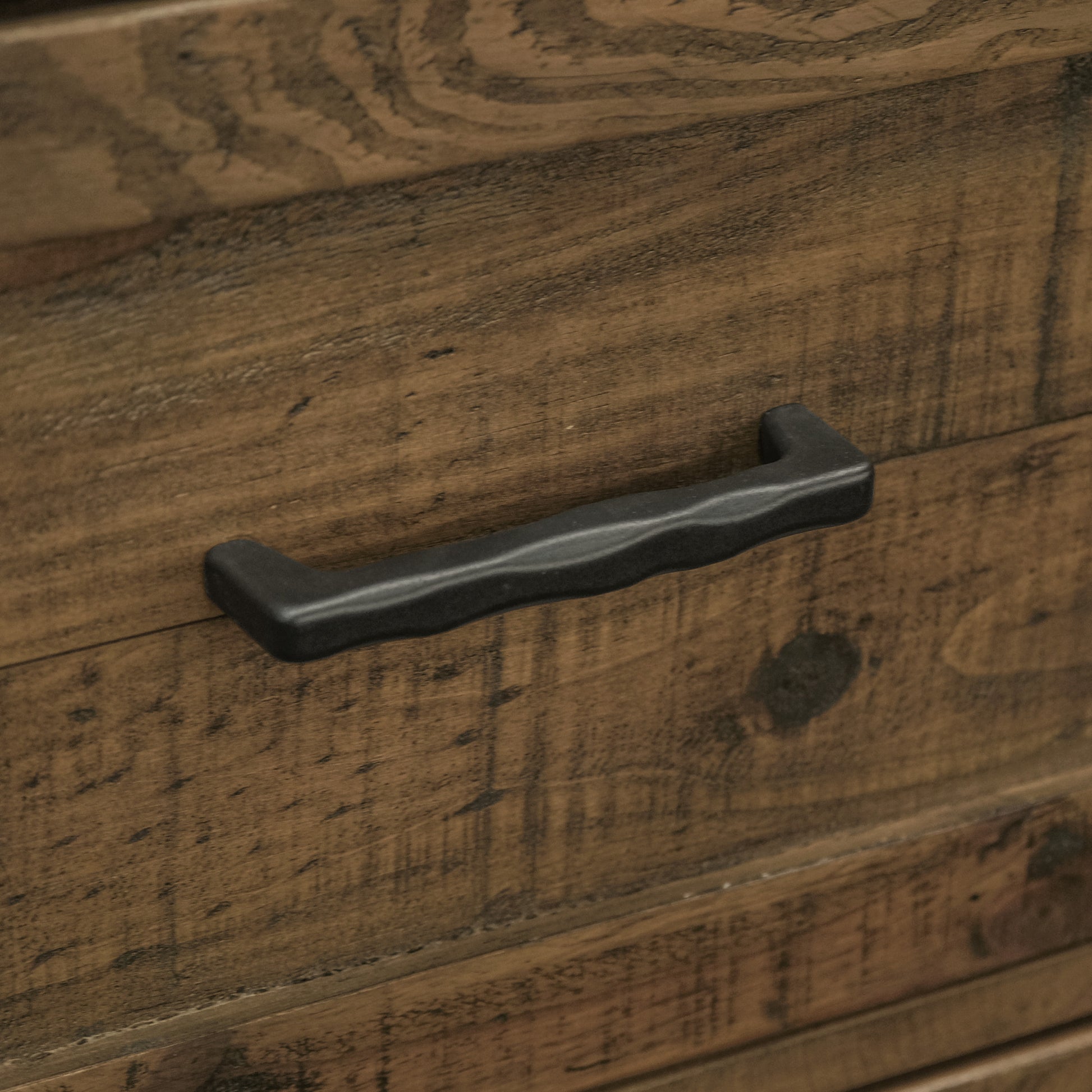 Distressed brown wood grain dresser with black matte bar pull handle rustic design