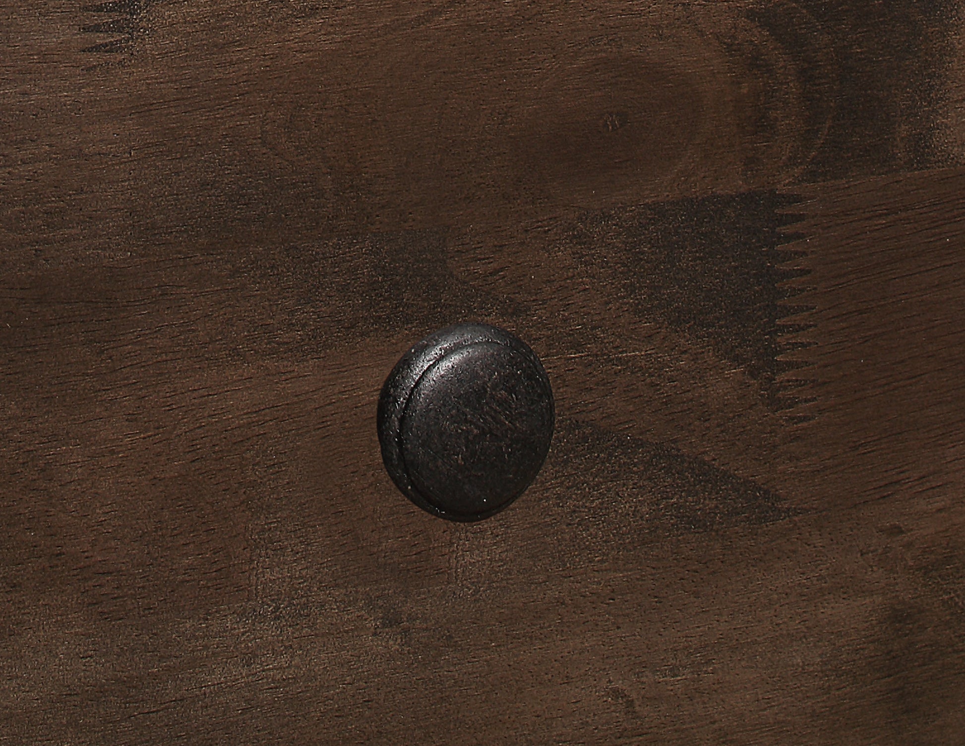 Dark wood drawer knob with rustic texture for rustic furniture