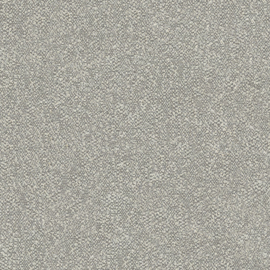 Closeup of textured grey boucle fabric for upholstery showing looped yarns and subtle variations in color for a modern feel