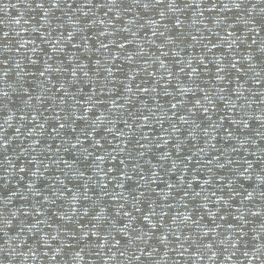 Closeup of textured grey and white boucle fabric with a subtle shimmer