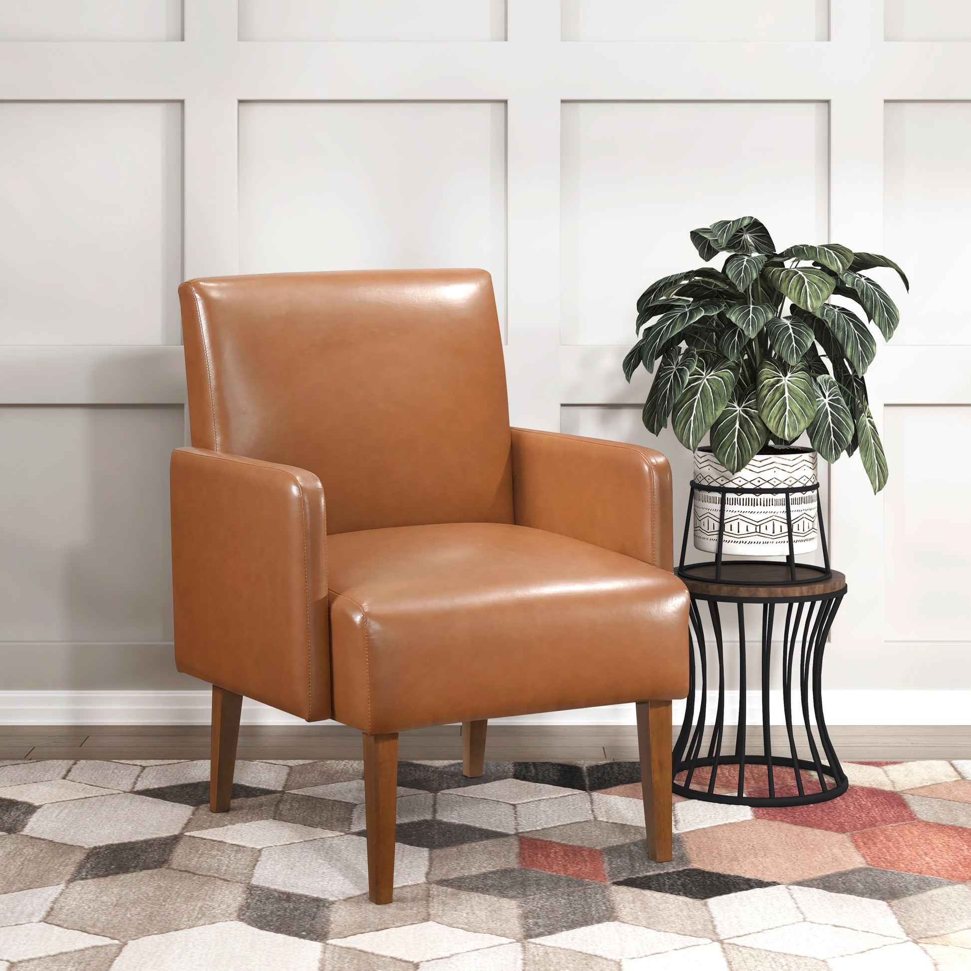 Midcentury modern accent chair in rich tan faux leather with tapered wooden legs