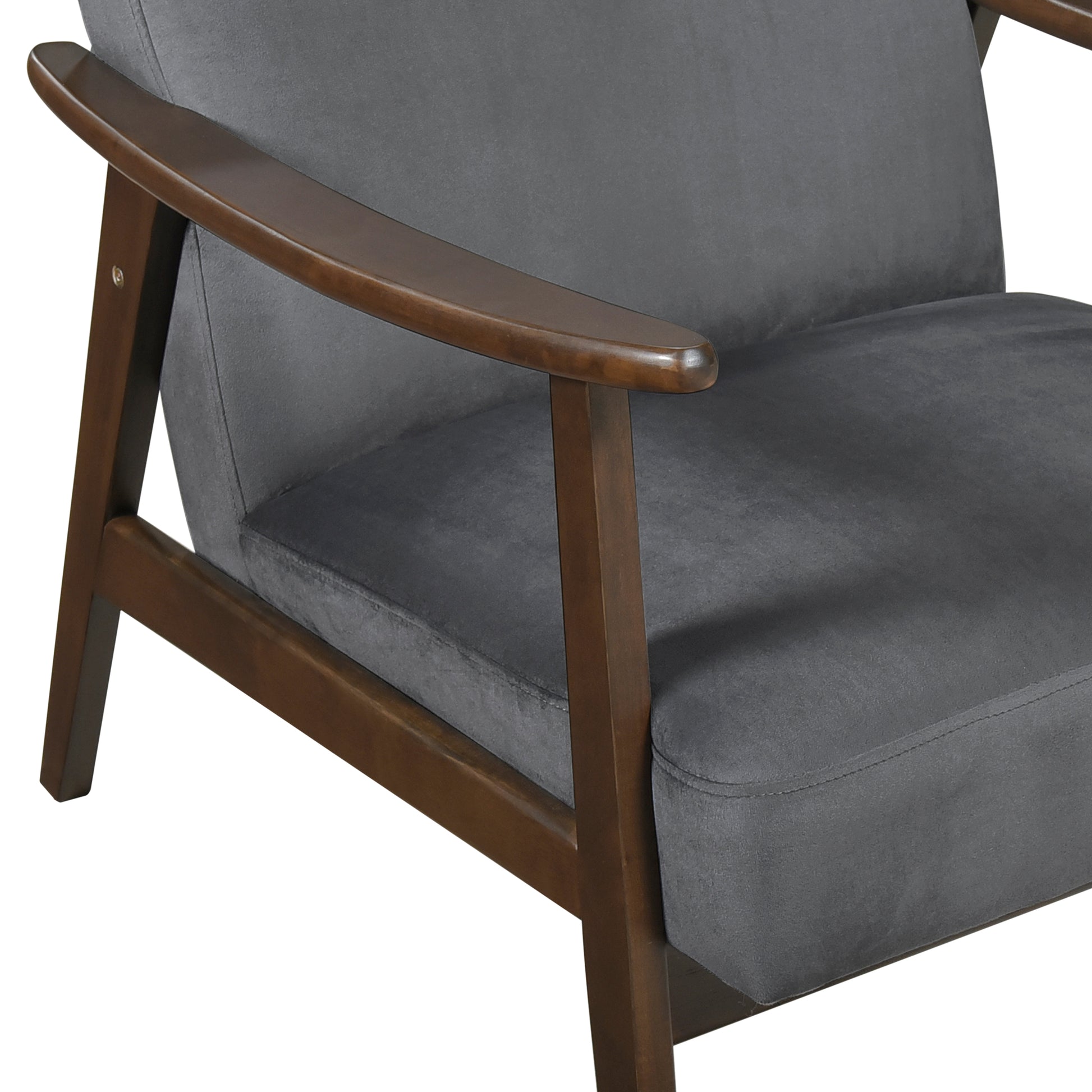 Close up of a grey fabric armchair with rich brown wooden armrests and frame