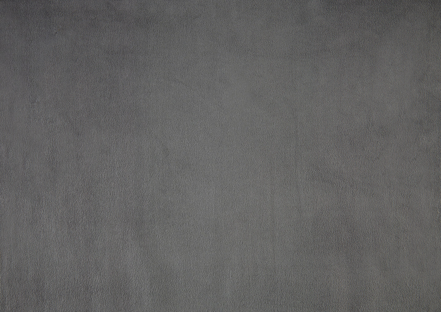 Closeup of textured charcoal gray fabric for upholstery