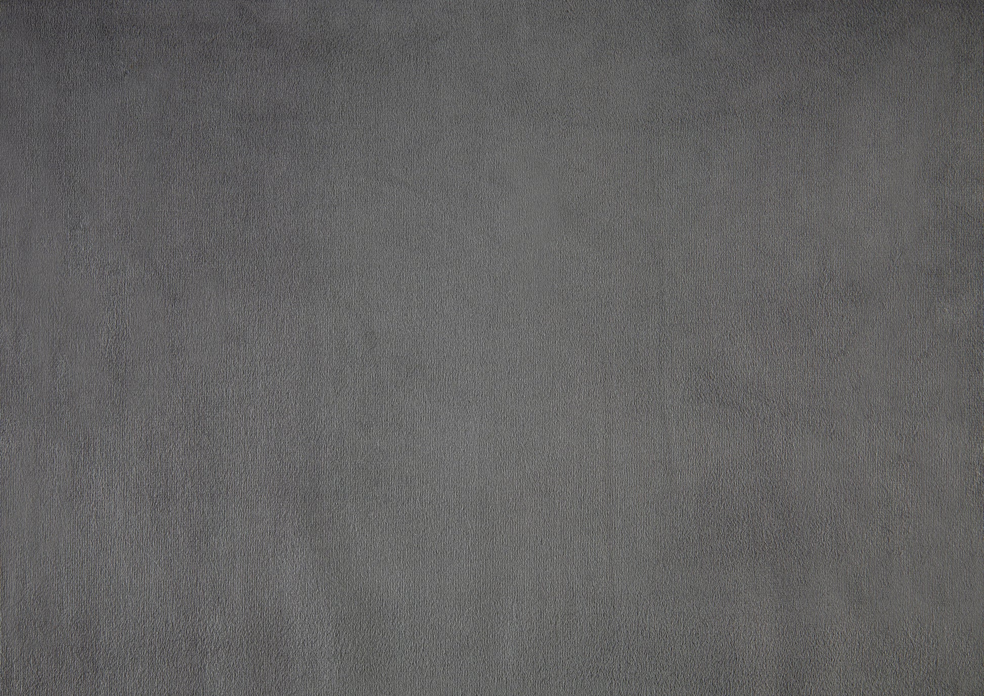 Closeup of textured charcoal gray fabric for upholstery