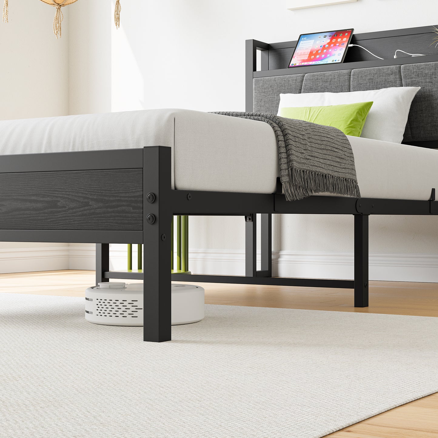 Dark wood and black metal platform bed with integrated USB charging station in headboard