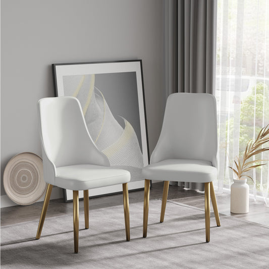 Two elegant white accent chairs with gold legs perfect for a modern living room