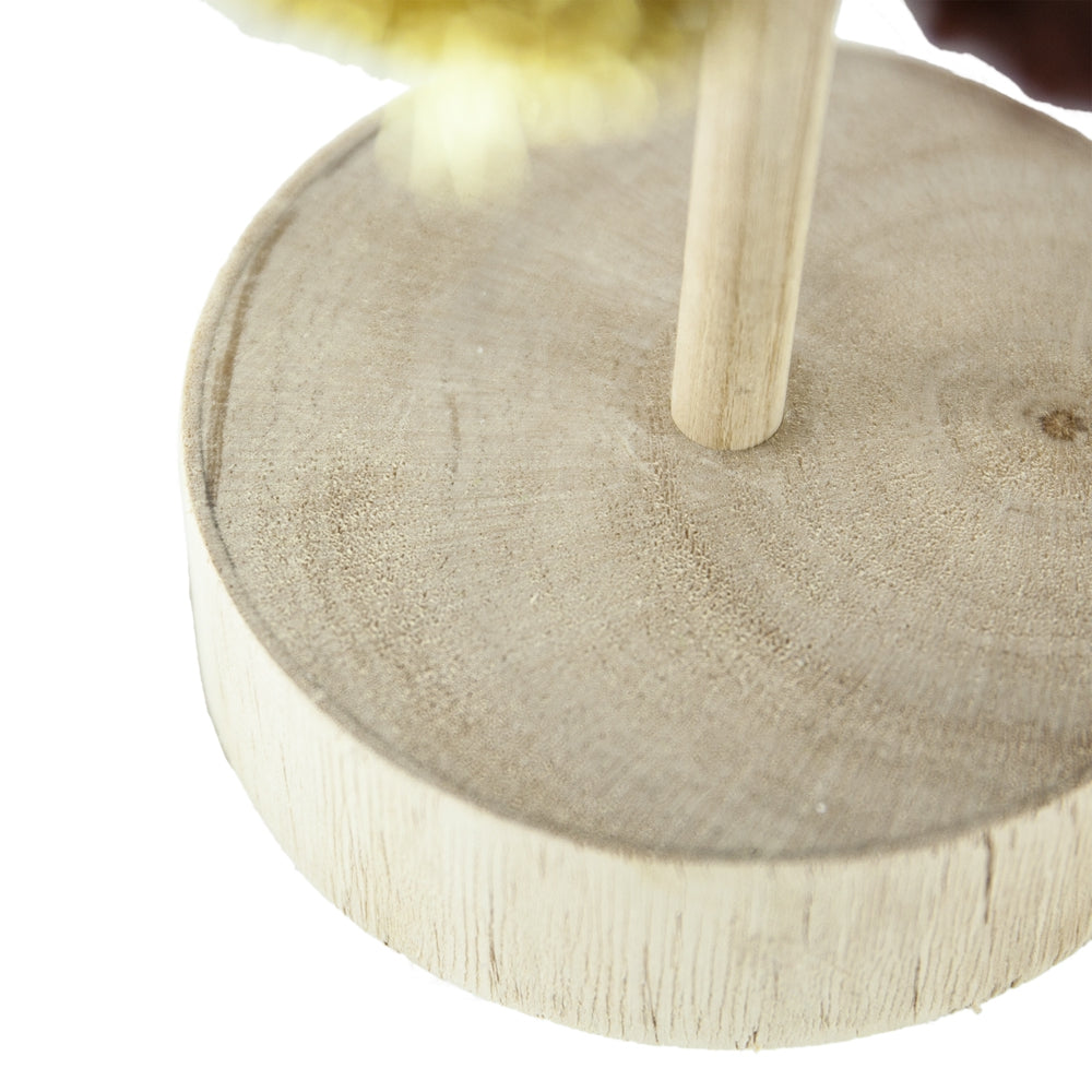 Natural wood slice base with a central wooden dowel for display