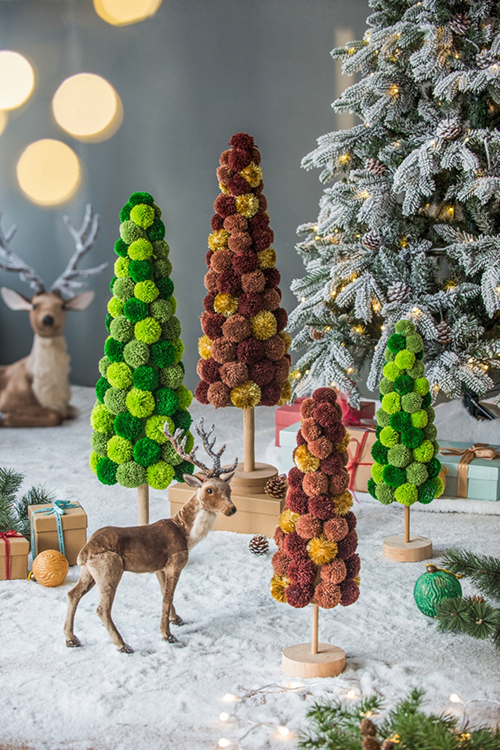 Handmade pom pom Christmas tree in lime green and dark green for festive decor