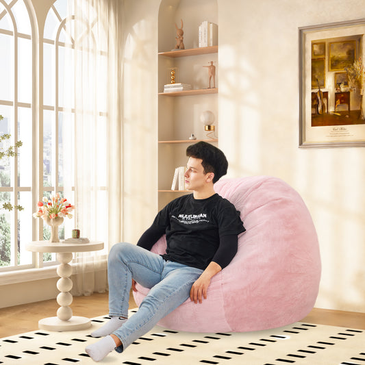 Fluffy pink bean bag chair with plush fabric perfect for cozy gaming sessions
