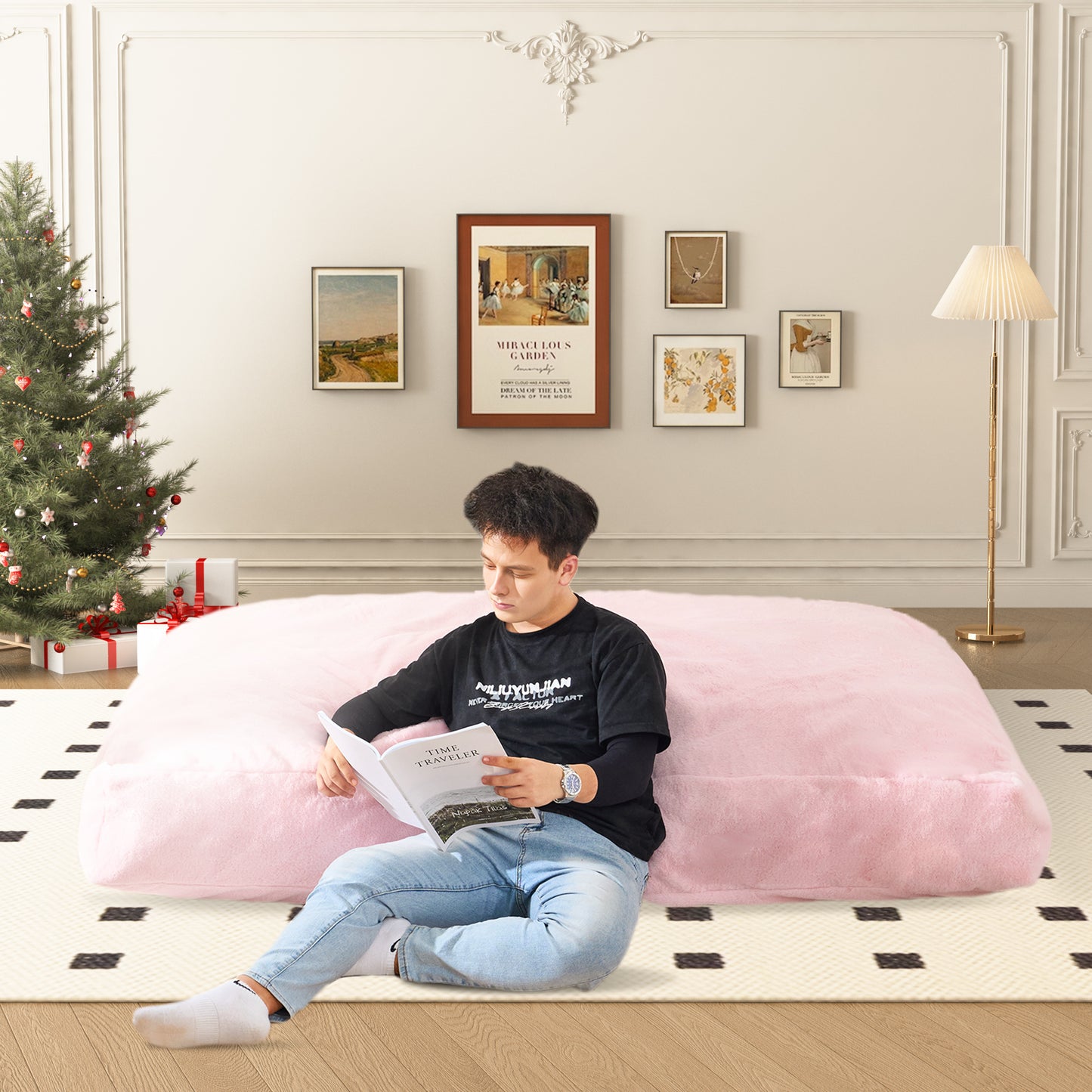 Oversized pink shag floor pillow providing comfortable seating for reading relaxing at home