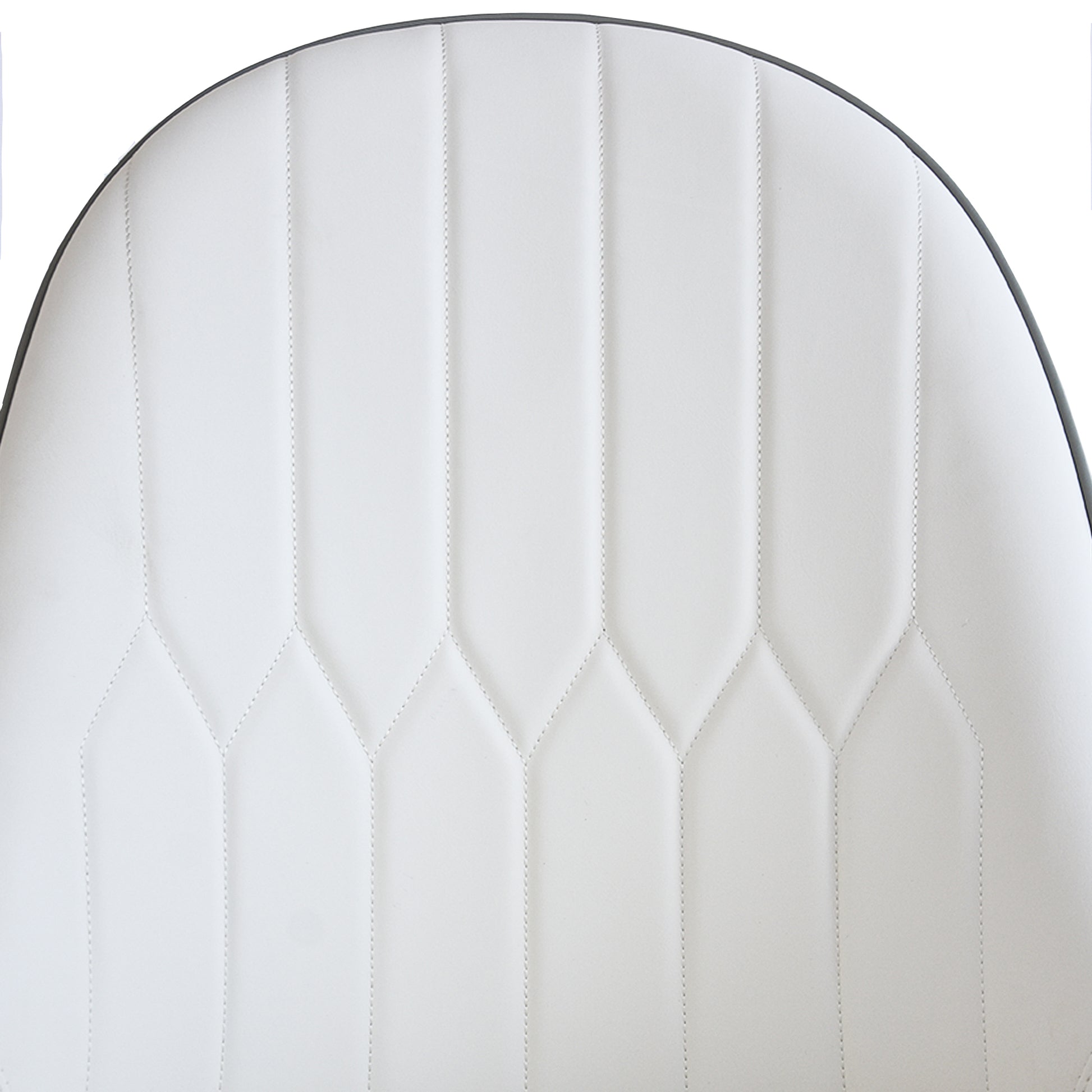 White upholstered chair back with diamond stitching detail
