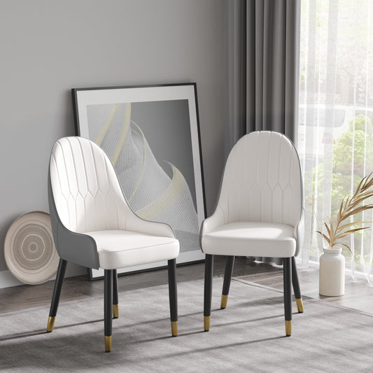 Elegant white faux leather dining chair with tufted back and goldtipped legs