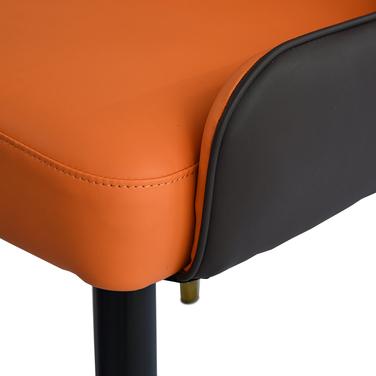 Orange and black faux leather accent chair seat detail
