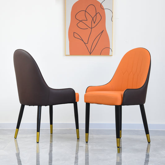 Modern accent chair in brown faux leather with goldtipped black legs