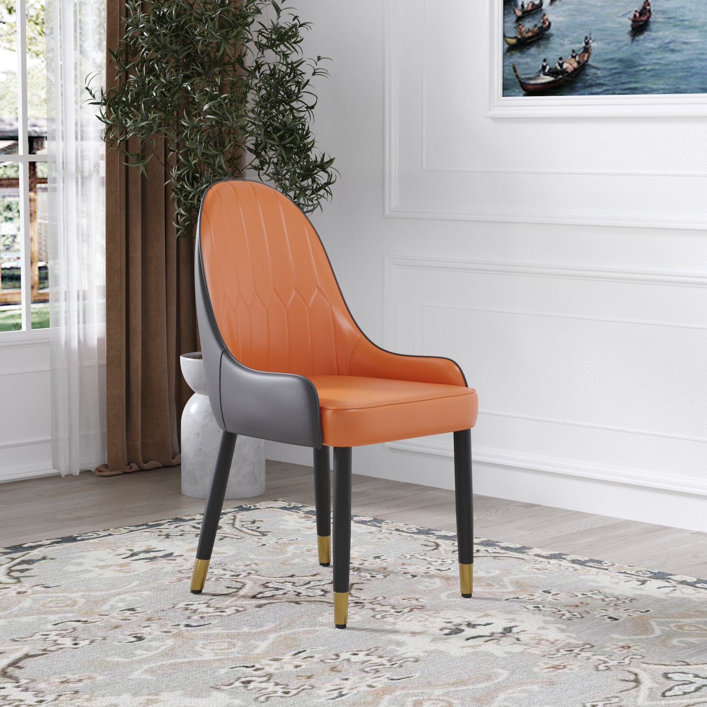 Orange upholstered dining chair with diamond stitch back and black legs