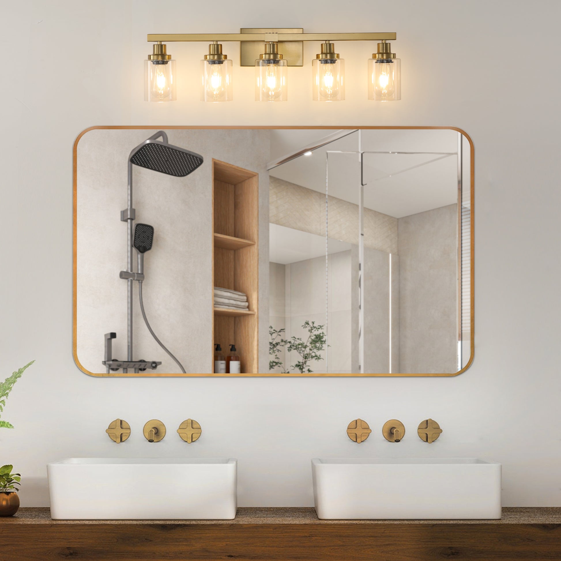 Brass fivelight bathroom vanity light with clear glass shades