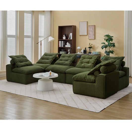 Plush green corduroy modular sofa with deep cushions perfect for a cozy living room setup