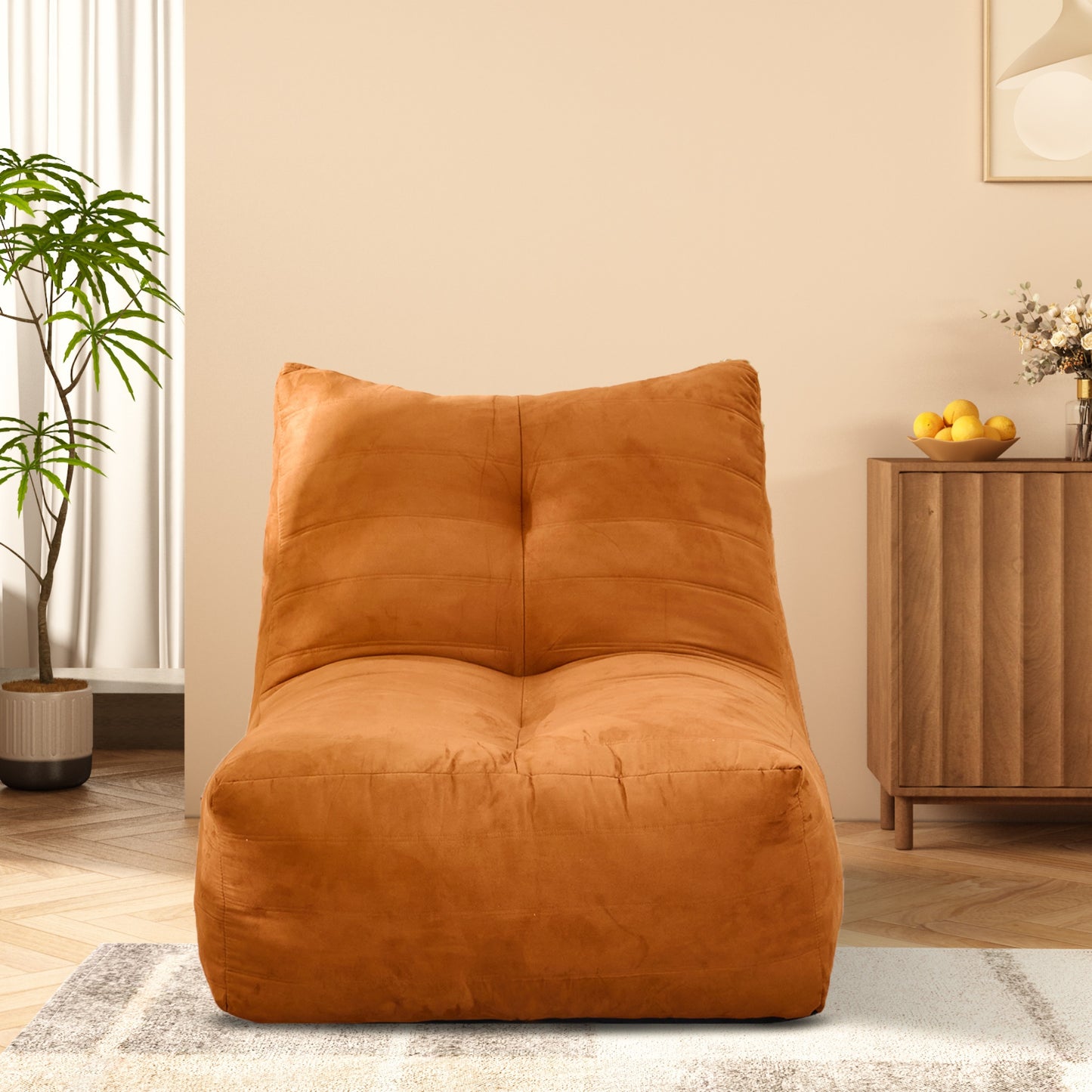 Oversized russet suede bean bag chair with horizontal channel stitching perfect for relaxing