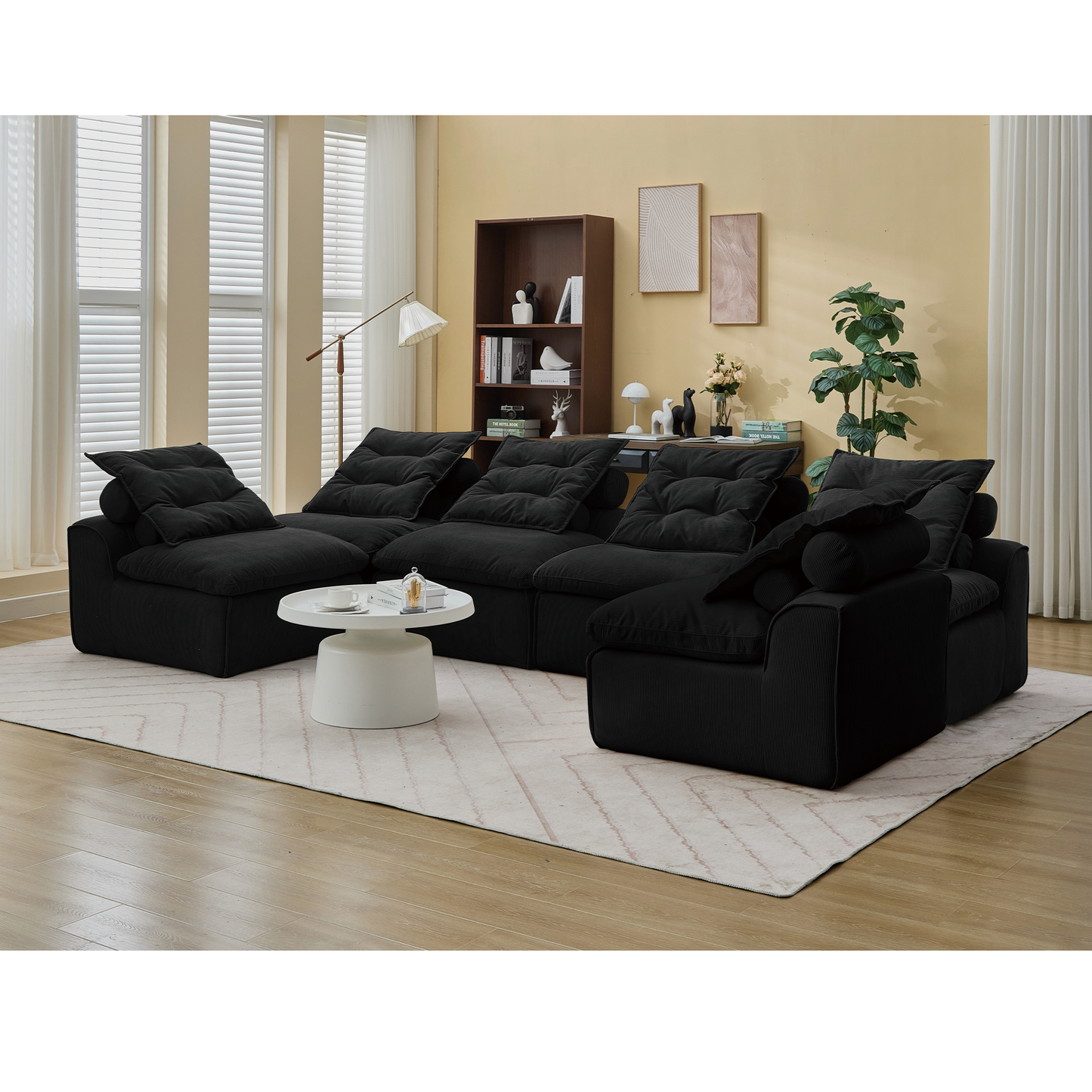 Black corduroy sectional sofa with plush cushions perfect for modern living rooms