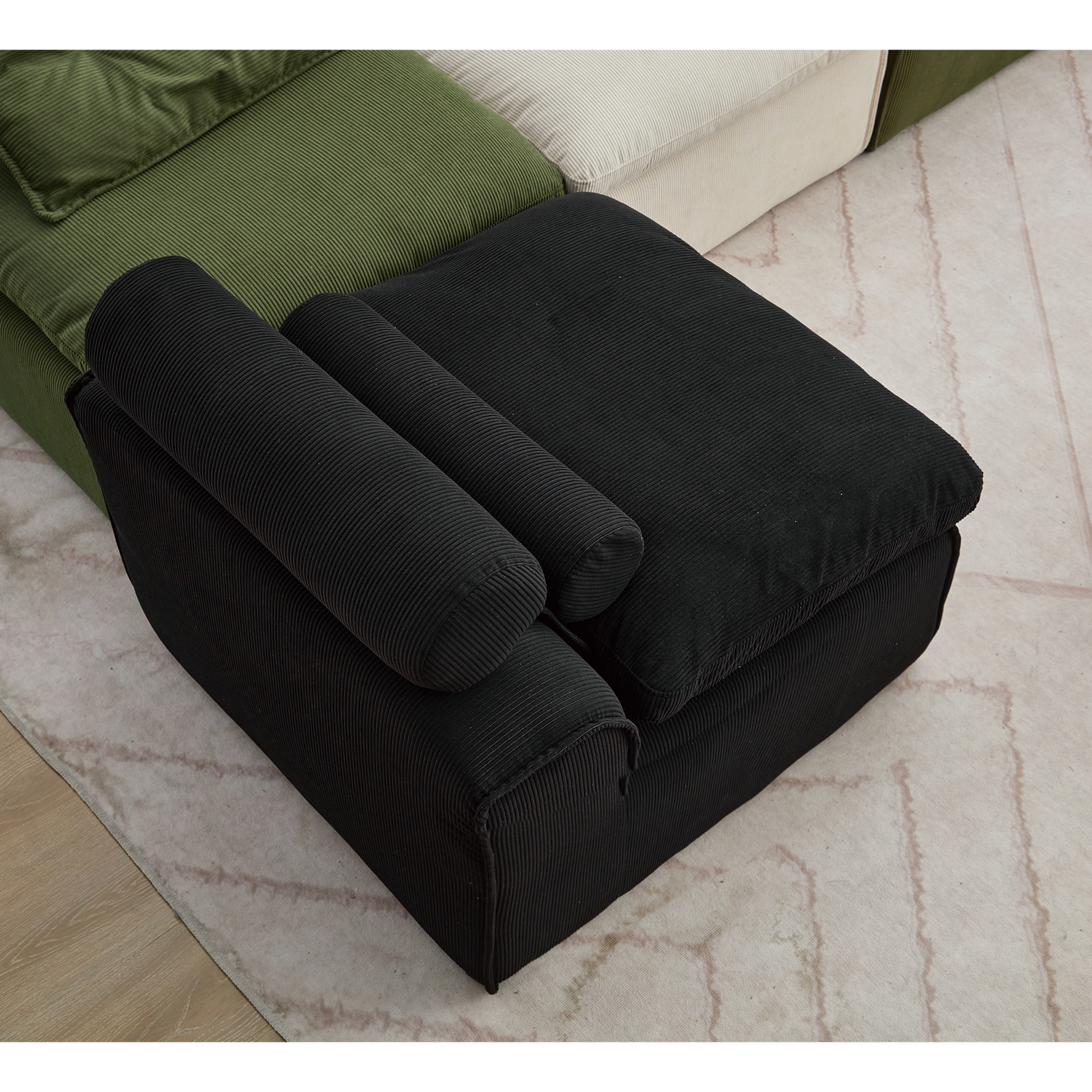 Black corduroy modular sofa armrest with plush cylinders modern design