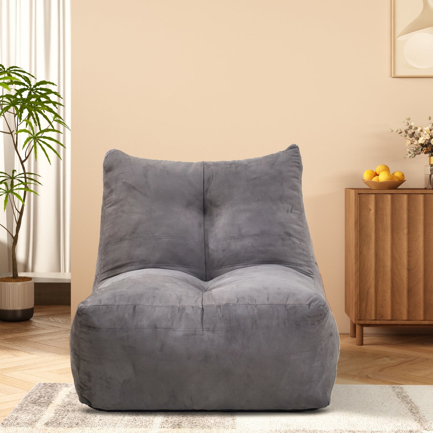 Gray velvet bean bag chair with tufted back perfect for lounging