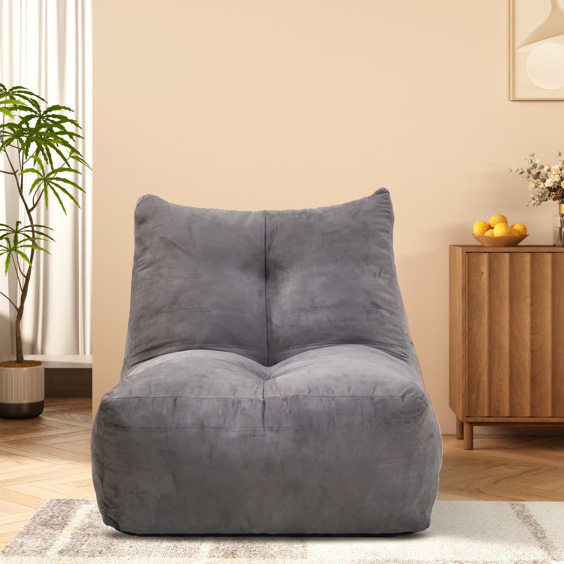Gray velvet bean bag chair with tufted back perfect for lounging