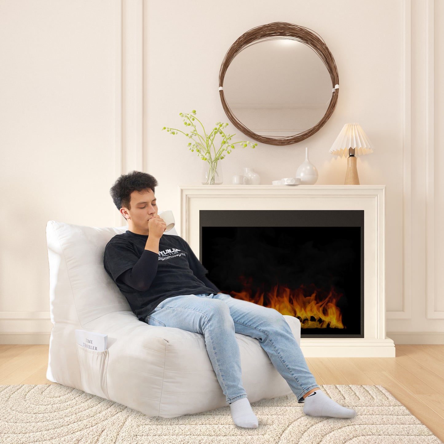 Cozy white bean bag chair with side pocket holding a book perfect for relaxing by the fireplace