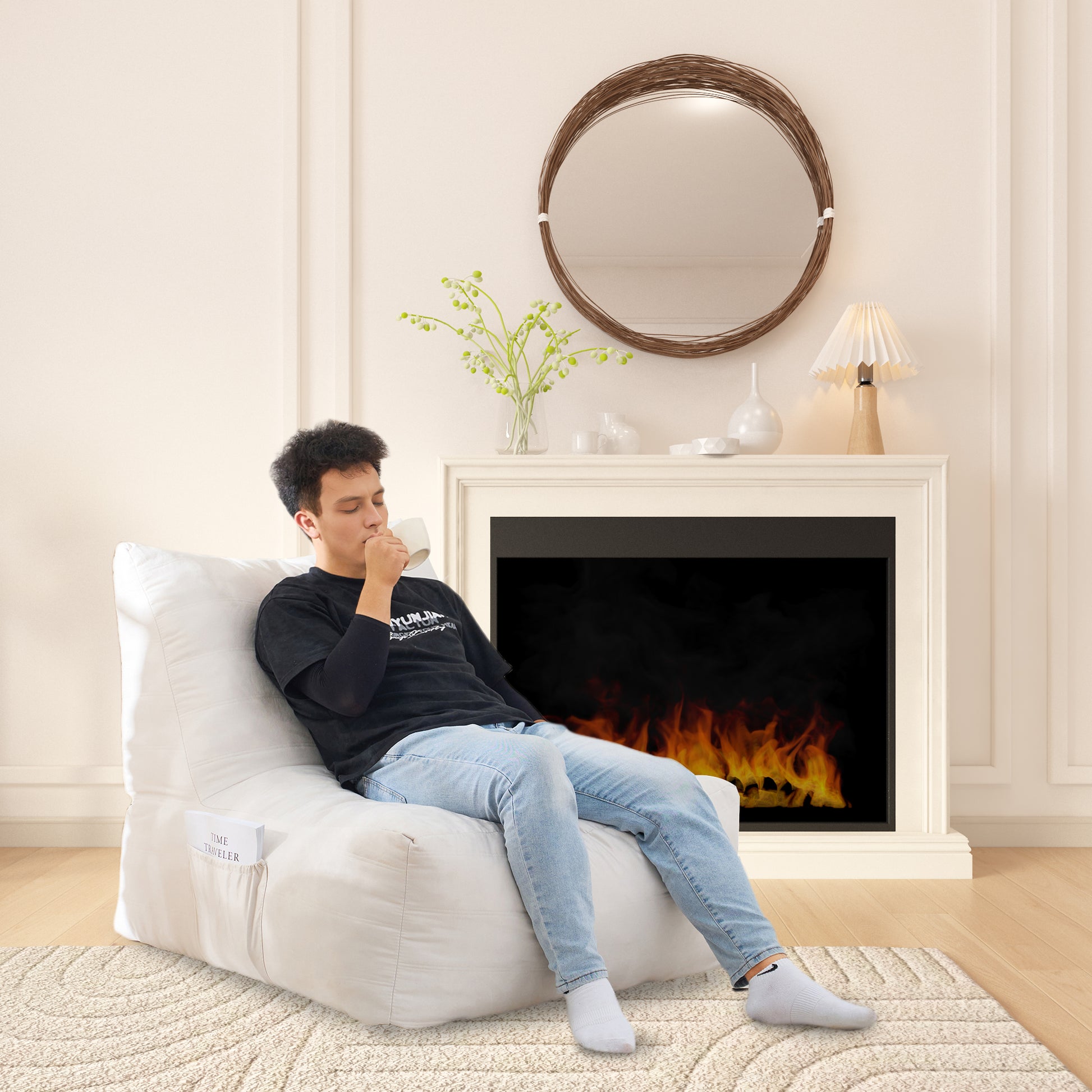 Cozy white bean bag chair with side pocket holding a book perfect for relaxing by the fireplace