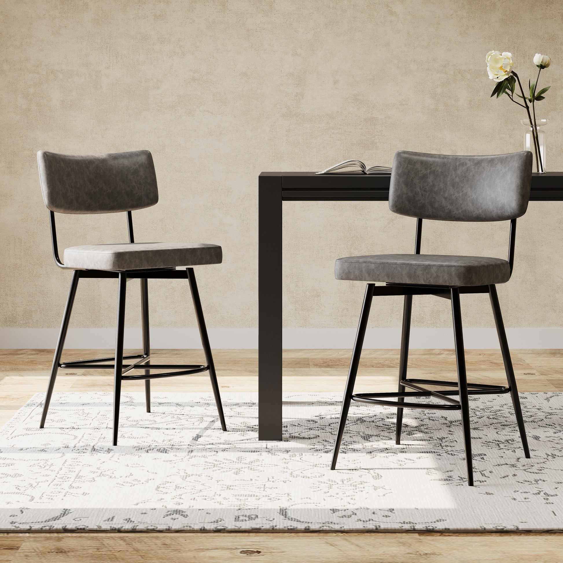 Gray faux leather swivel bar stool with black metal legs and a modern design