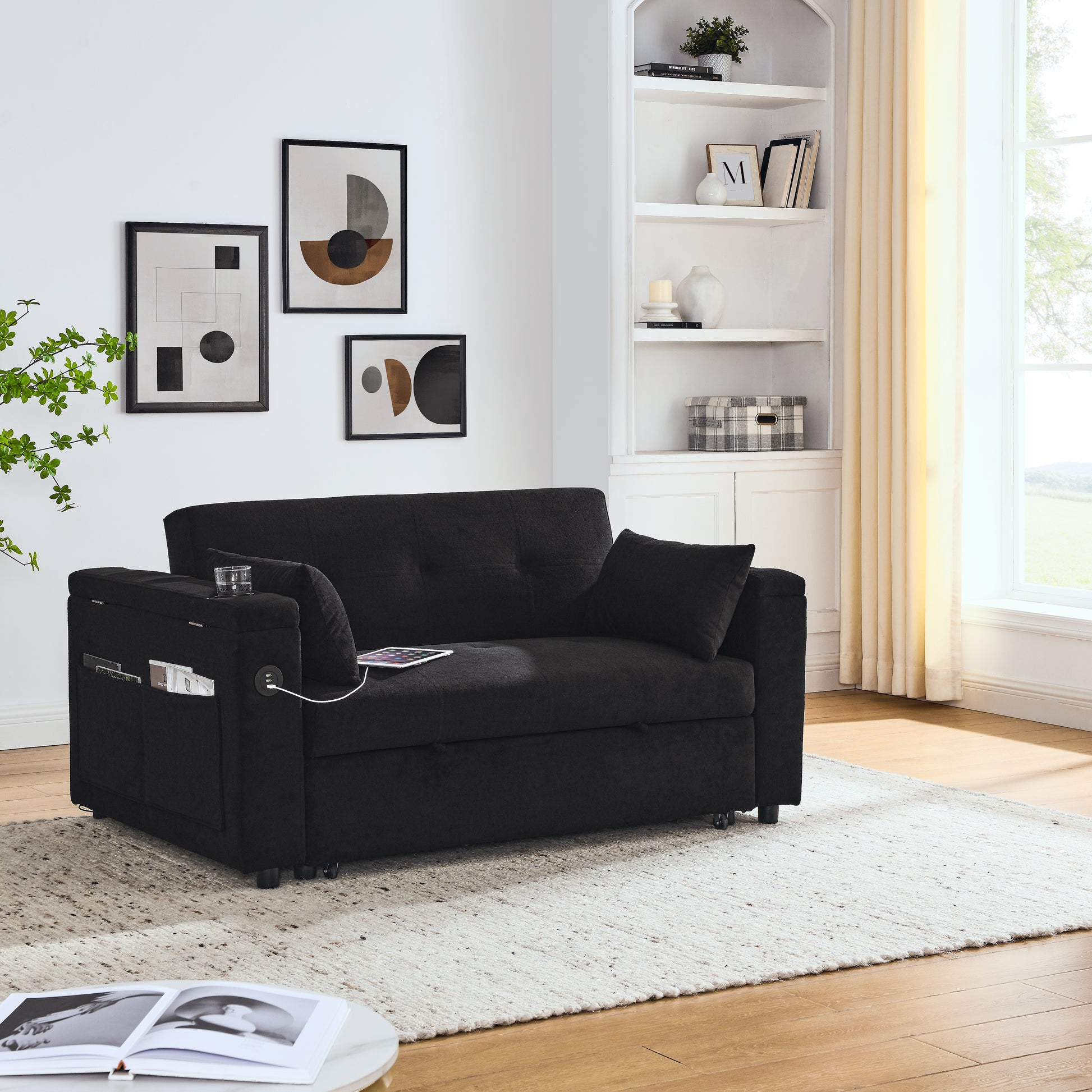 Black upholstered convertible chair with builtin USB ports and side storage pockets