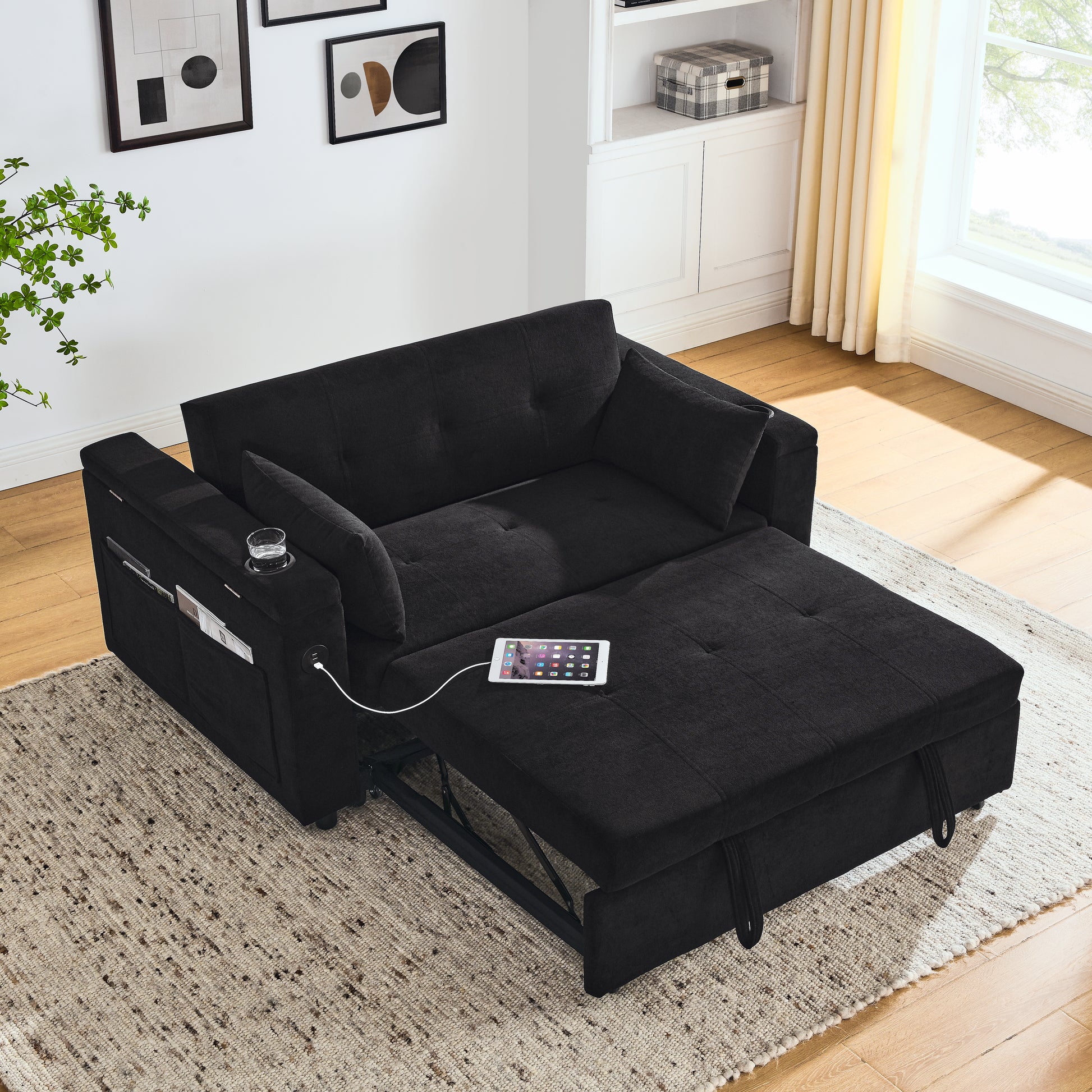 Black convertible sofa with builtin USB ports and side storage pockets ideal for small spaces