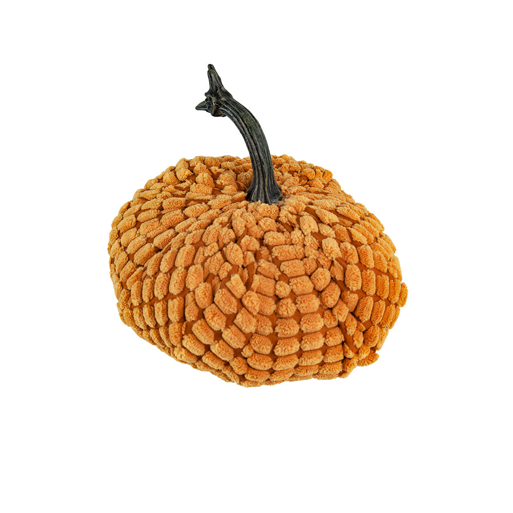 Plush orange pumpkin decorative accent with textured surface and dark stem